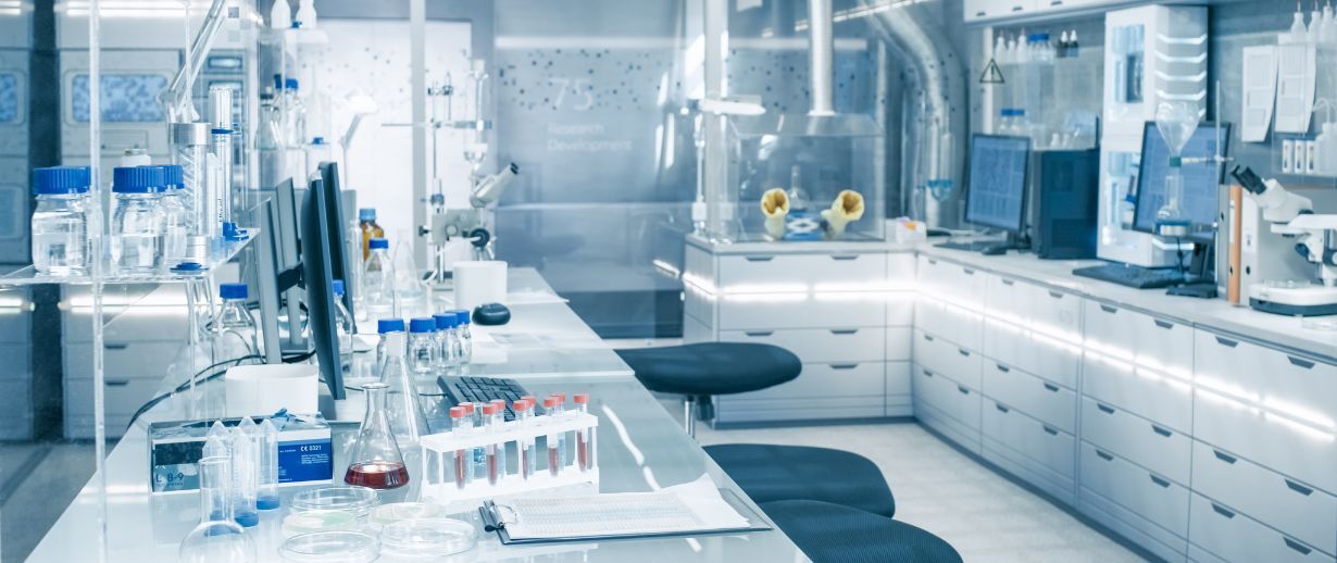 Bright and Ultra Modern High Tech Laboratory Full of Advanced Technology, Computers, Analysing Machines, Test Tubes and Beakers.